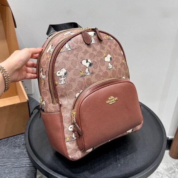 Coach Handbags - Elegant Coach Peanuts Backpack